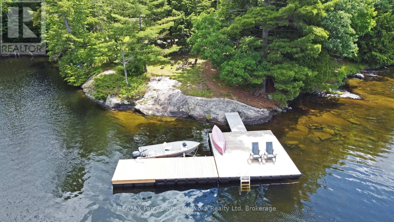 Large dock and boat on Crane Lake